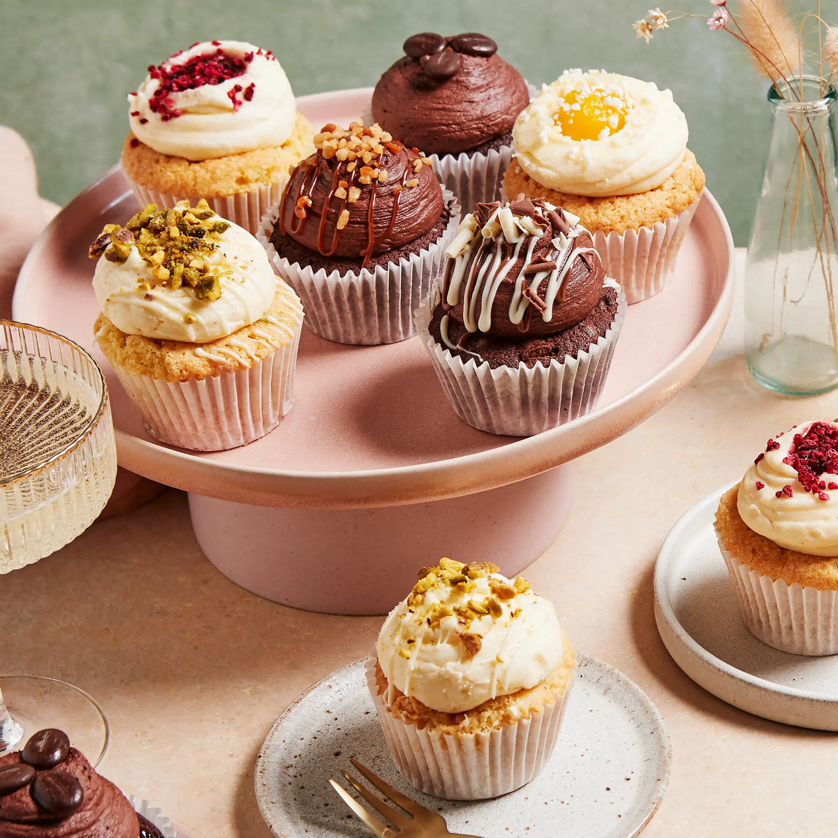 A Chummys mixed cupcake box: six flavours on a cake stand