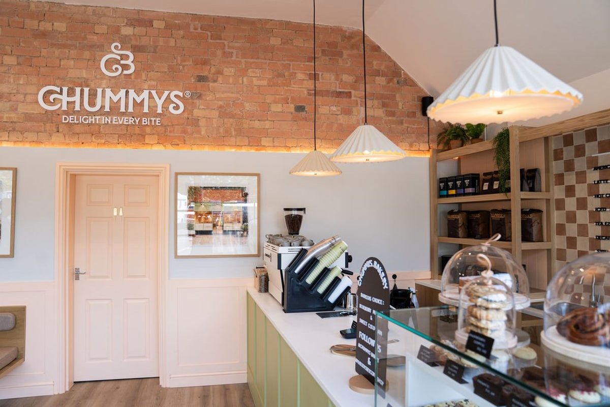 Inside the Chummys coffee shop in Droitwich: the counter, the coffee machine and the pastry display