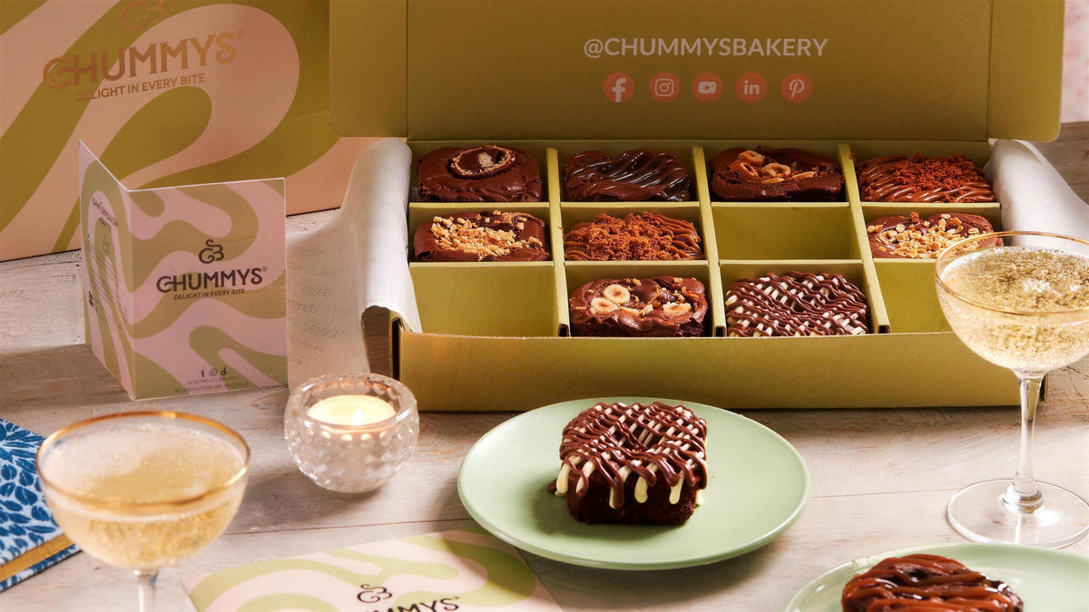 A Chummys Bakery gift box filled with a selection of chocolate brownies and cookies